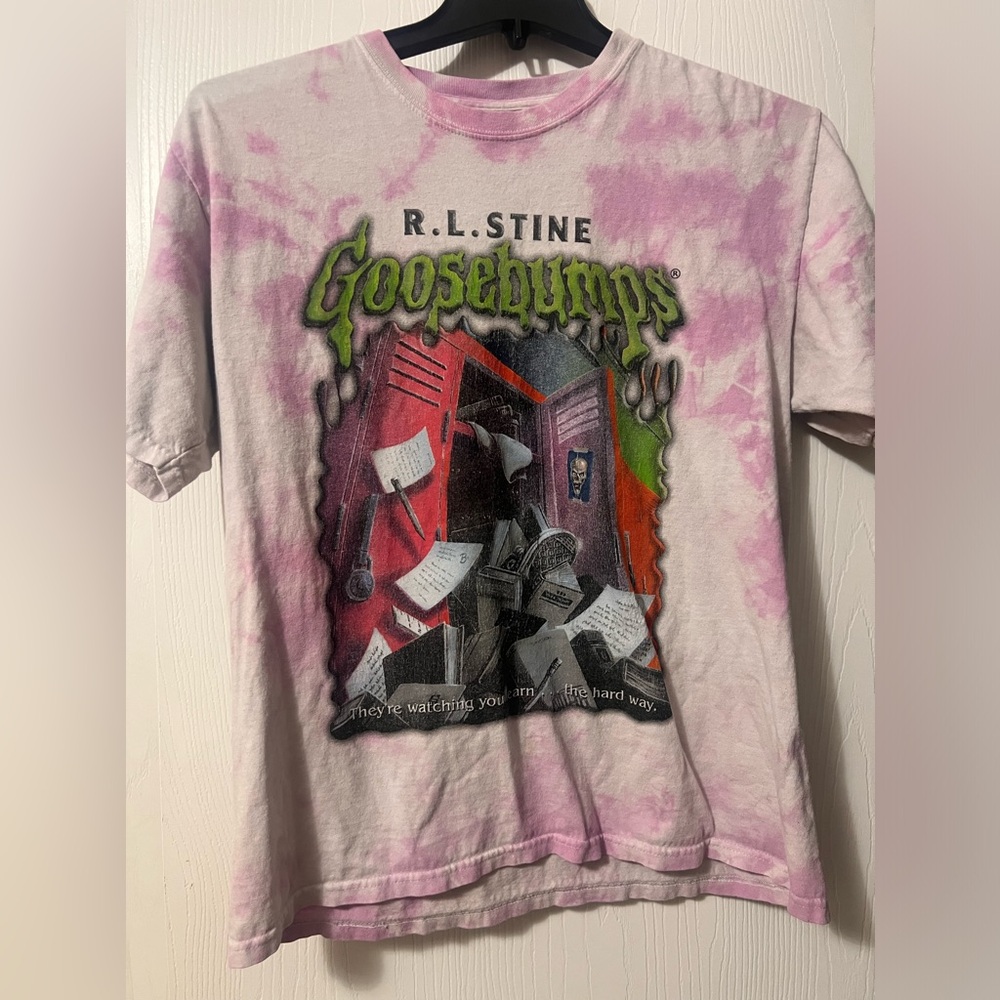 white and pink goosebumps shirt